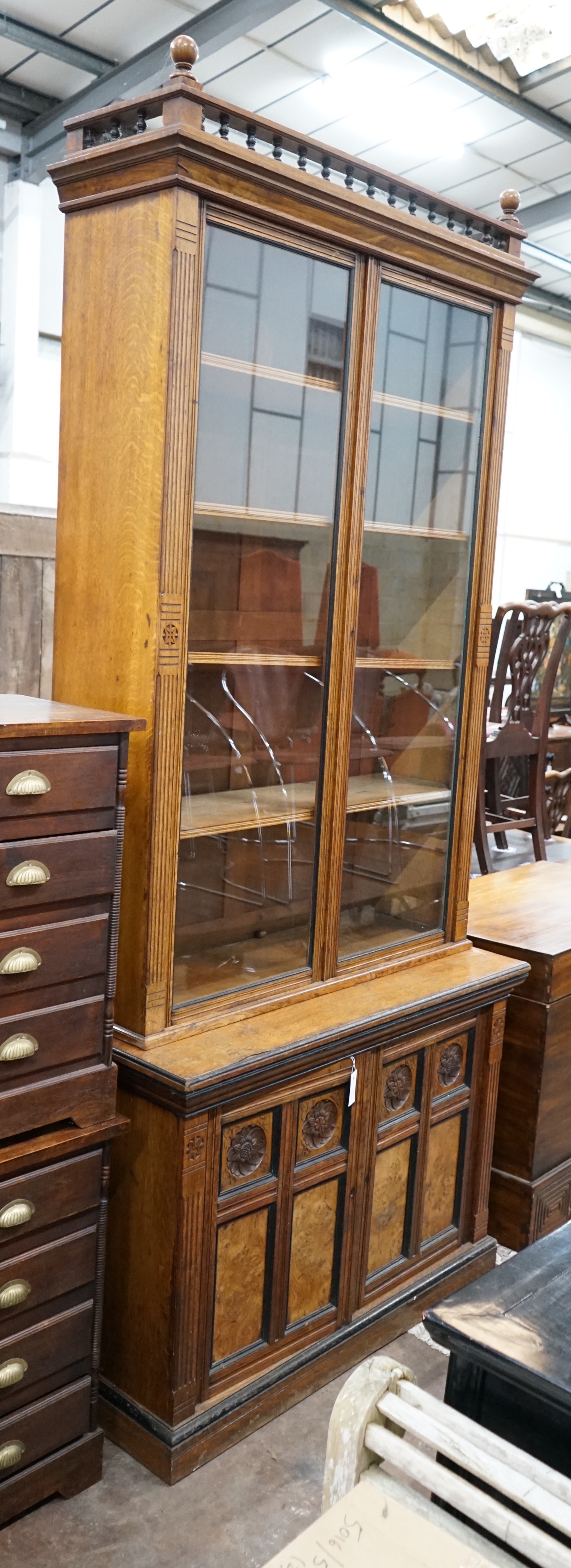 A late Victorian Aesthetic movement oak and pollard oak bookcase, width 114cm depth 50cm height 262cm